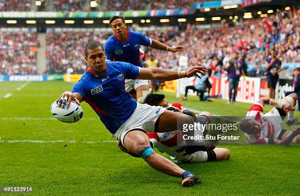 Paul Perez of Samoa scores his teams first try during the 2015 Rugby World Cup Pool B match between Samoa and Japan at Stadium mk on October 3, 2015...