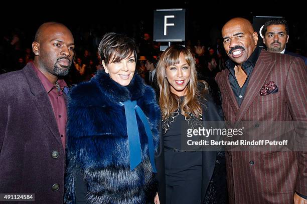 Kris Jenner with her companion Corey Gamble and TV Host Steve Harvey with his wife Marjorie attend the Elie Saab show as part of the Paris Fashion...