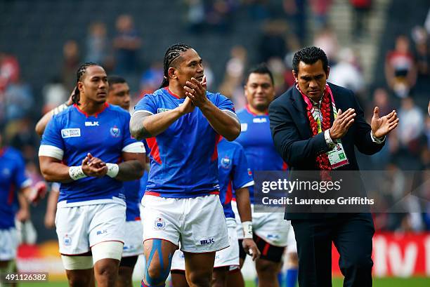 Alesana Tuilagi and Maurie Faasavalu of Samoa applaud the fans after the 2015 Rugby World Cup Pool B match between Samoa and Japan at Stadium mk on...