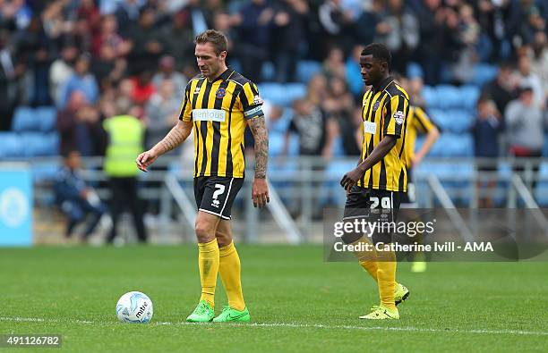 Dejected looking Liam Lawrence and Larnell Cole of Shrewsbury Town look on during the Sky Bet League One match between Coventry City and Shrewsbury...