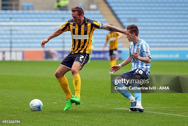 Liam Lawrence of Shrewsbury Town and Ryan Kent of Coventry City in action during the Sky Bet League One match between Coventry City and Shrewsbury...