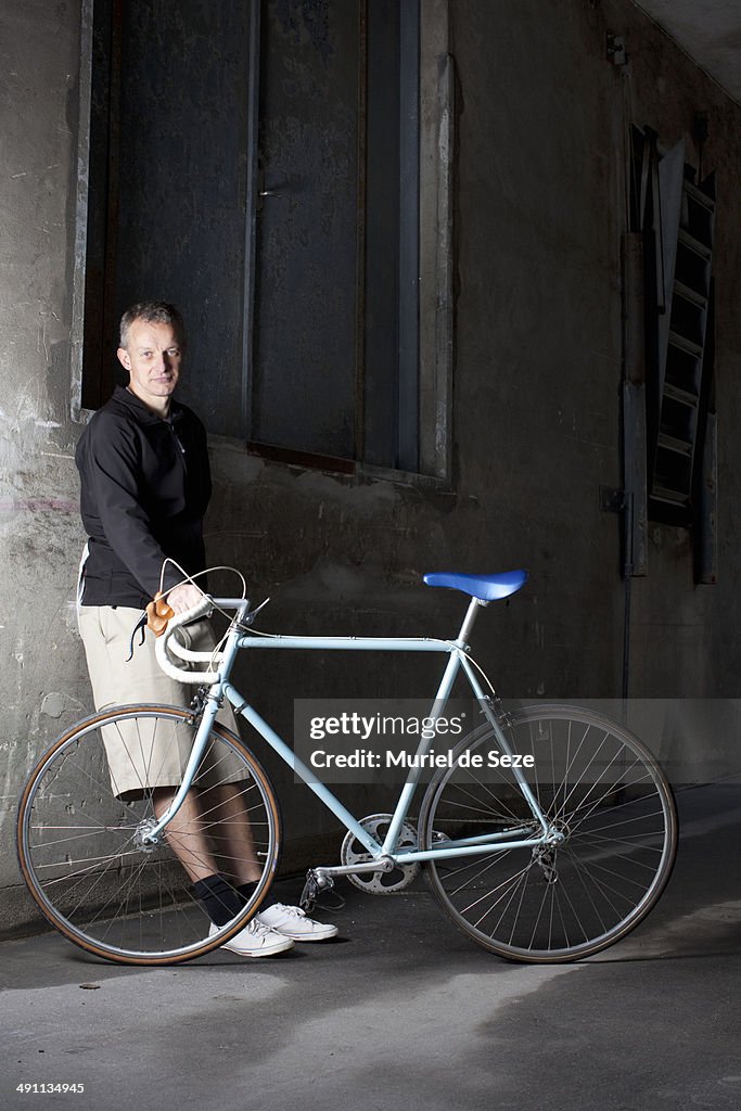 Men with bicycle