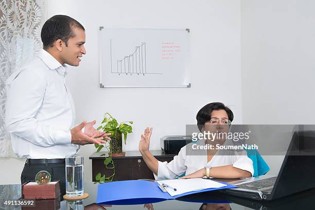 workplace conflict - boss angry stockfoto's en -beelden