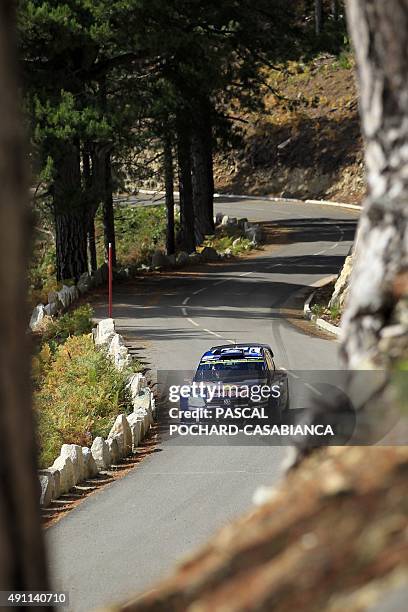 Finnish driver Jari Matti Latvala steers his Volkswagen Polo R during the sixth special stage of the WRC Tour de Corse Rally championship on October...