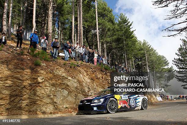 Norway driver Andreas Mikkelsen steers his Volkswagen Polo R during the sixth special stage of the WRC Tour de Corse Rally championship on October 3,...