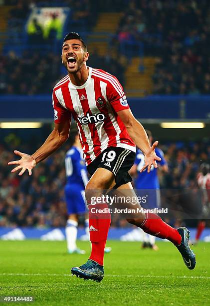 Graziano Pelle of Southampton celebrates scoring his team's third goal during the Barclays Premier League match between Chelsea and Southampton at...