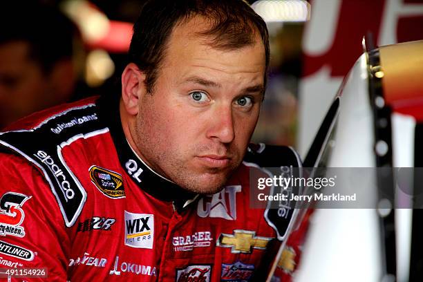 Ryan Newman, driver of the Quicken Loans Chevrolet, looks on in the garage area during practice for the NASCAR Sprint Cup Series AAA 400 at Dover...