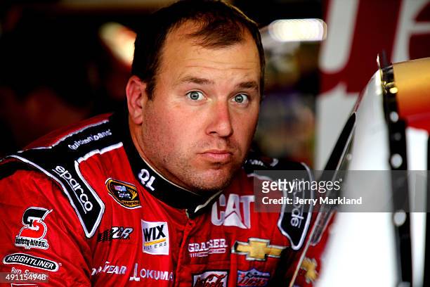 Ryan Newman, driver of the Quicken Loans Chevrolet, looks on in the garage area during practice for the NASCAR Sprint Cup Series AAA 400 at Dover...
