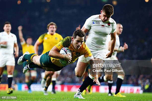 Bernard Foley of Australia goes over to score their second try during the 2015 Rugby World Cup Pool A match between England and Australia at...