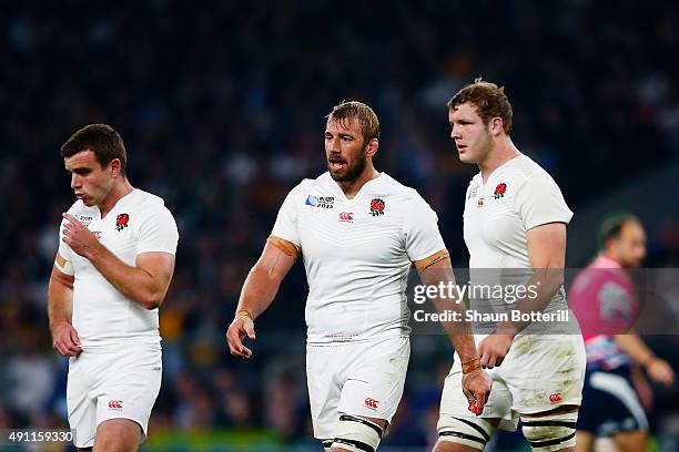 Dejected George Ford, Chris Robshaw and Joe Launchbury of England look on during the 2015 Rugby World Cup Pool A match between England and Australia...