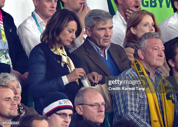 Carole Middleton and Michael Middleton attend the England v Australia match during the Rugby World Cup 2015 on October 3, 2015 at Twickenham Stadium,...