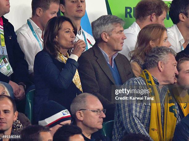 Carole Middleton and Michael Middleton attend the England v Australia match during the Rugby World Cup 2015 on October 3, 2015 at Twickenham Stadium,...
