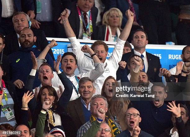 Carole Middleton, Michael Middleton, Prince Harry and James Middleton attend the England v Australia match during the Rugby World Cup 2015 on October...
