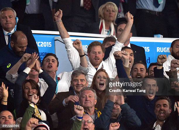Carole Middleton, Michael Middleton, Prince Harry and James Middleton attend the England v Australia match during the Rugby World Cup 2015 on October...