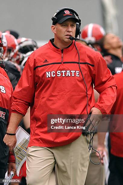 Head Coach Dave Doeren of the North Carolina State Wolfpack looks on during their game against the Louisville Cardinals at Carter-Finley Stadium on...