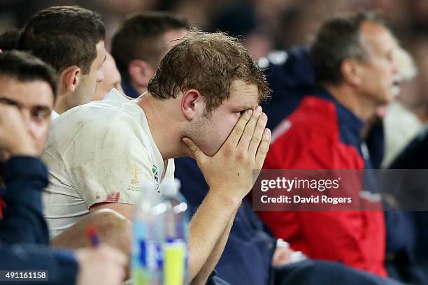 Joe Launchbury of England looks holds his head in his hands on the bench during the 2015 Rugby World Cup Pool A match between England and Australia...