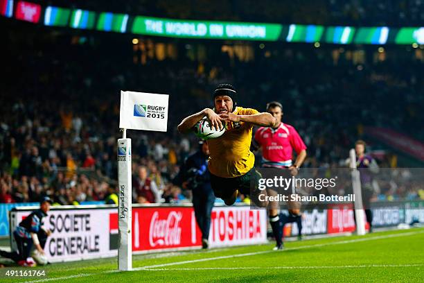 Matt Giteau of Australia goes over to score their third try during the 2015 Rugby World Cup Pool A match between England and Australia at Twickenham...