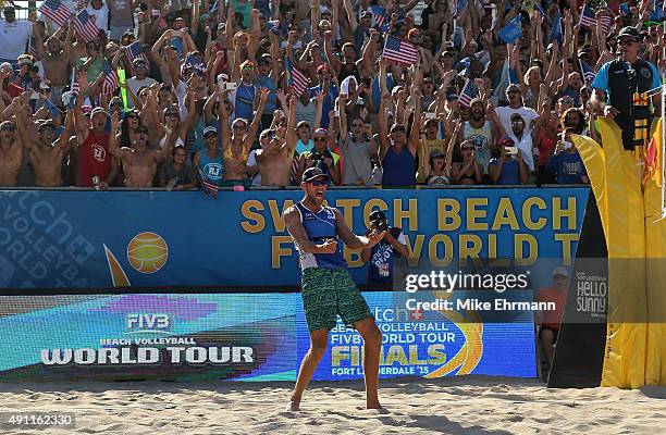 Nick Lucena and Phil Dalhausser of the United States celebrate after winning a match against Alexander Brouwer and Robert Meeuwsen of the Netherlands...