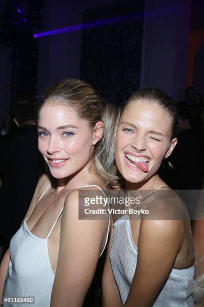 Doutzen Kroes and Constance Jablonski attend Vogue 95th Anniversary Party on October 3, 2015 in Paris, France.