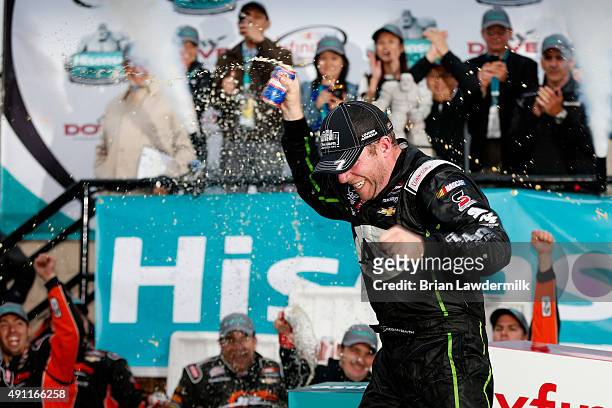 Regan Smith, driver of the Fire Alarm Services Chevrolet, celebrates in Victory LanVictory Laneafter winning the NASCAR XFINITY Series Hisense 200 at...