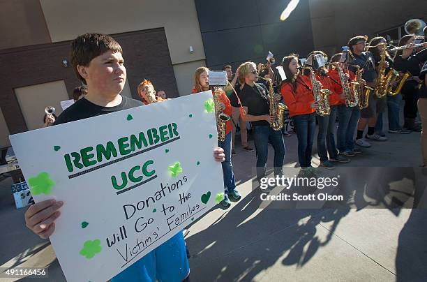 Members of the Roseburg High School band try to raise funds to help victims of the mass shooting at Umpqua Community College on October 3, 2015 in...