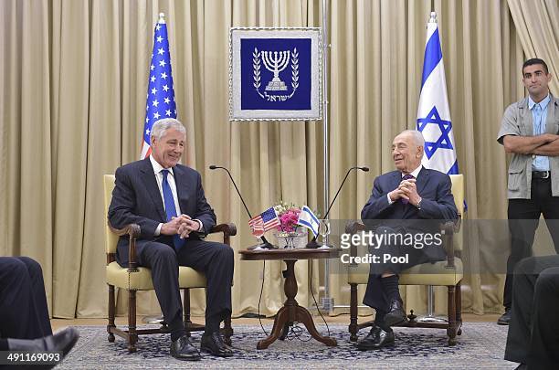 Defense Secretary Chuck Hagel talks with Israeli President Shimon Peres at the prime minister's office on May 16, 2014 in Jerusalem, Israel. Hagel is...
