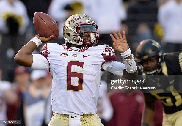 Everett Golson of the Florida State Seminoles drops back to pass against the Wake Forest Demon Deacons during their game at BB&T Field on October 3,...