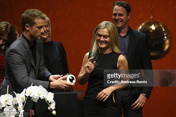 Alexander Fehling hands over the ZFF 'Austria, Germany, Switzerland Section' Award for 'Thank You for Bombing ' to director Barbara Eder at the Award...