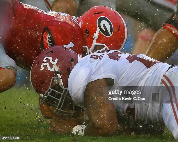 Ryan Anderson of the Alabama Crimson Tide recovers a fumble by Greyson Lambert of the Georgia Bulldogs at Sanford Stadium on October 3, 2015 in...