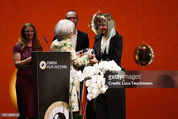 Director Betzabe Garcia is seen on stage being awarded for the Best Documentary Film for 'Kings of Nowhere' at the Award Night Ceremony during the...