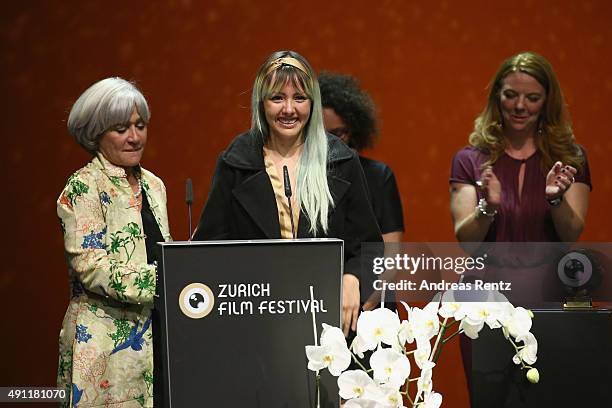 Director Betzabe Garcia is seen on stage being awarded for the Best Documentary Film for 'Kings of Nowhere' by jury president Catherine Dussart at...