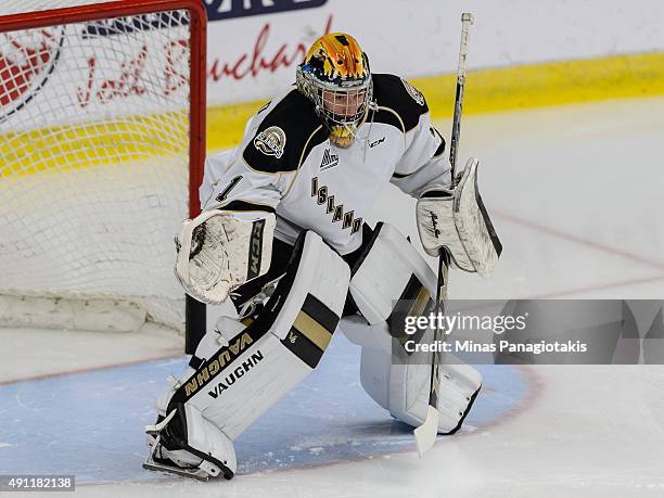 Mason McDonald of the Charlottetown Islanders remains focused during the warmup period prior to the QMJHL game against the Blainville-Boisbriand...