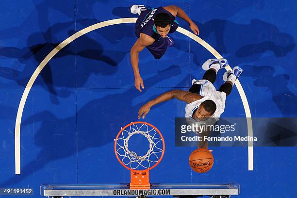 Keith Appling of the Orlando Magic shoots the ball against the Charlotte Hornets during a preseason game on October 3, 2015 at Amway Center in...