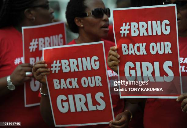 Nigerian women living in Kenya demonstrate to press for the release of Nigerian school girls kidnapped in nothern Nigeria by members of the Boko...