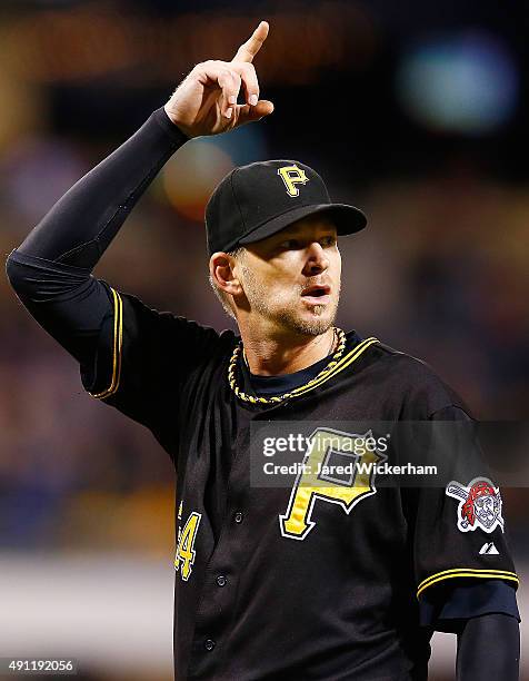 Burnett of the Pittsburgh Pirates gestures after being pulled from the game in the 7th inning in his final career regular season game against the...