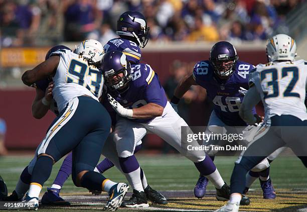 Brandon Fusco of the Minnesota Vikings blocks during an NFL game against the San Diego Chargers at TCF Bank Stadium September 27, 2015 in...