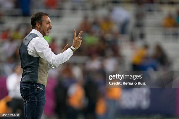 Gustavo Matosas coach of Atlas gives instructions to his players during the 12th round match between Atlas and Tigres UANL as part of the Apertura...