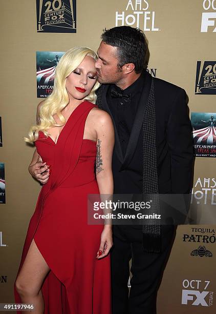 Actress/singer Lady Gaga and actor Taylor Kinney attend the premiere screening of FX's "American Horror Story: Hotel" at Regal Cinemas L.A. Live on...