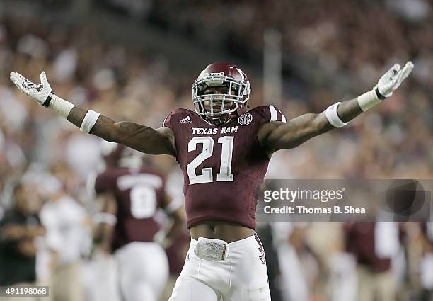 Brandon Williams of the Texas A&M Aggies fires up the crowd while playing agains the Mississippi State Bulldogs in the second half on October 3, 2015...