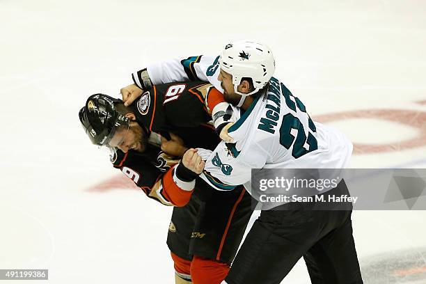 Patrick Maroon of the Anaheim Ducks and Frazer McLaren of the San Jose Sharks fight during the third period of a preseason game at Honda Center on...