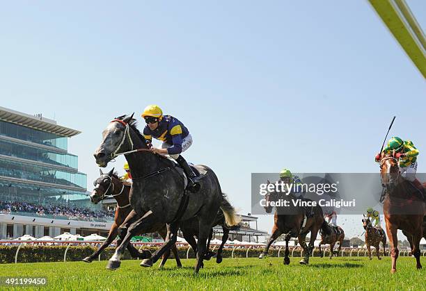 Dwayne Dunn riding Chautauqua winning Race 3, the Gilgai Stakes during Turnbull Stakes Day at Flemington Racecourse on October 4, 2015 in Melbourne,...