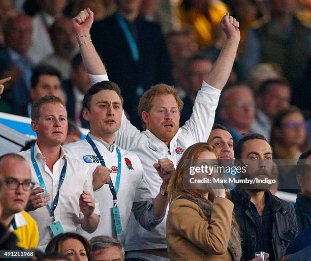 Guy Pelly, Charlie van Straubenzee, Prince Harry and James Middleton attend the England v Australia match during the Rugby World Cup 2015 at...