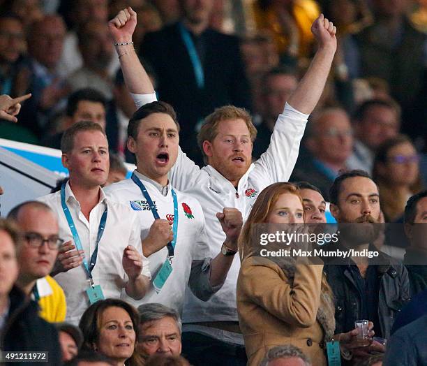 Guy Pelly, Charlie van Straubenzee, Prince Harry and James Middleton attend the England v Australia match during the Rugby World Cup 2015 at...