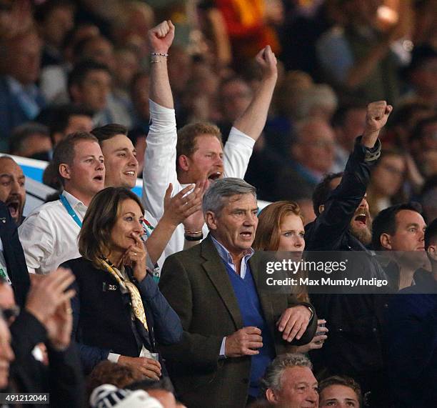 Guy Pelly, Charlie van Straubenzee, Prince Harry Carole Middleton and Michael Middleton attend the England v Australia match during the Rugby World...