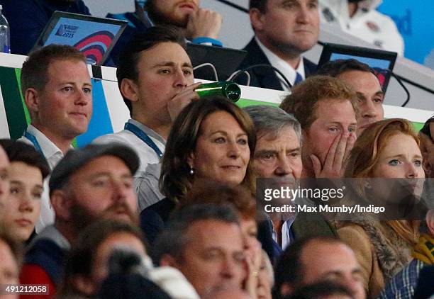 Guy Pelly, Charlie van Straubenzee, Carole Middleton, Michael Middleton and Prince Harry attend the England v Australia match during the Rugby World...