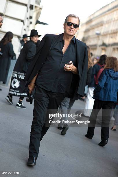 Photographer Mario Testino wears all black suit after Acne at Hotel Potocki during Paris Fashion Week Spring/Summer 16 on October 3, 2015 in Paris,...