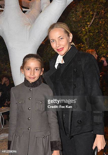 Melonie Foster Hennessy and her daughter attend the 'Bonpoint Cocktail' at L'Orangerie du Jardin du Luxembourg on October 03, 2015 in Paris, France.