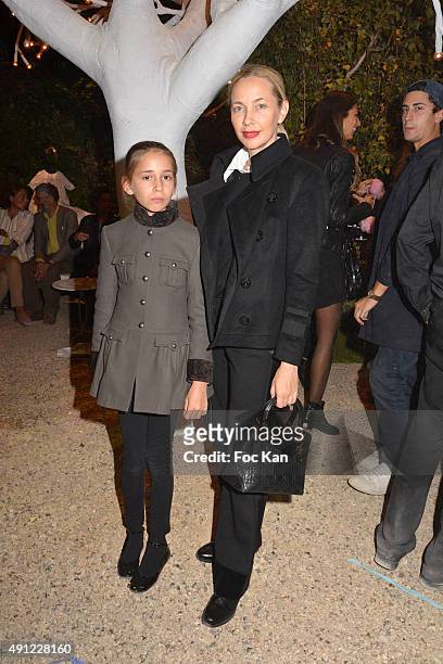 Melonie Foster Hennessy and her daughter attend the 'Bonpoint Cocktail' at L'Orangerie du Jardin du Luxembourg on October 03, 2015 in Paris, France.