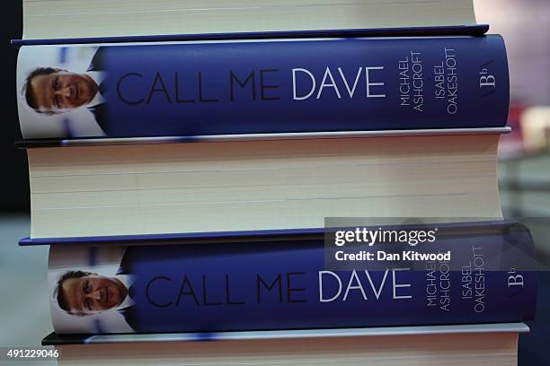The unauthorised biography of David Cameron 'Call Me Dave' by Michael Ashcroft and Isabel Oakeshott is sold on a stand at the Conservative Party...