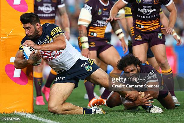 James Tamou of the Cowboys scores a try during the 2015 NRL Grand Final match between the Brisbane Broncos and the North Queensland Cowboys at ANZ...